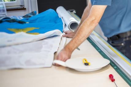 Konfektionieren eines Stoffdrucks